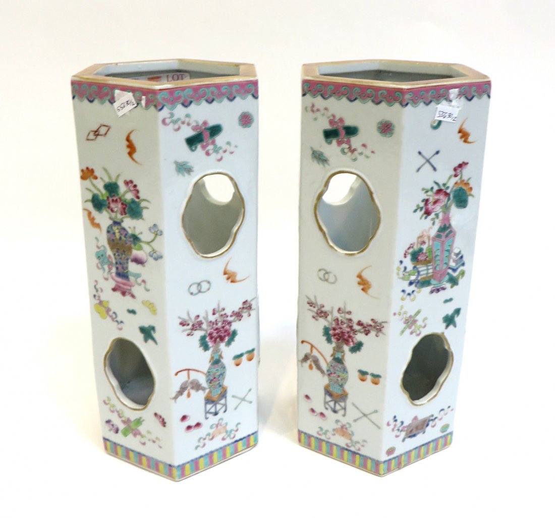 Pair Qianlong Mark Famille Rose Hat Stands: Each 11"pierced hat stands or dry vases, in garniture. Shipping: We are able to pack and ship this item to an address in the United States for $50.00 via USPS Priority Mail or via FedEx Ground/Home De