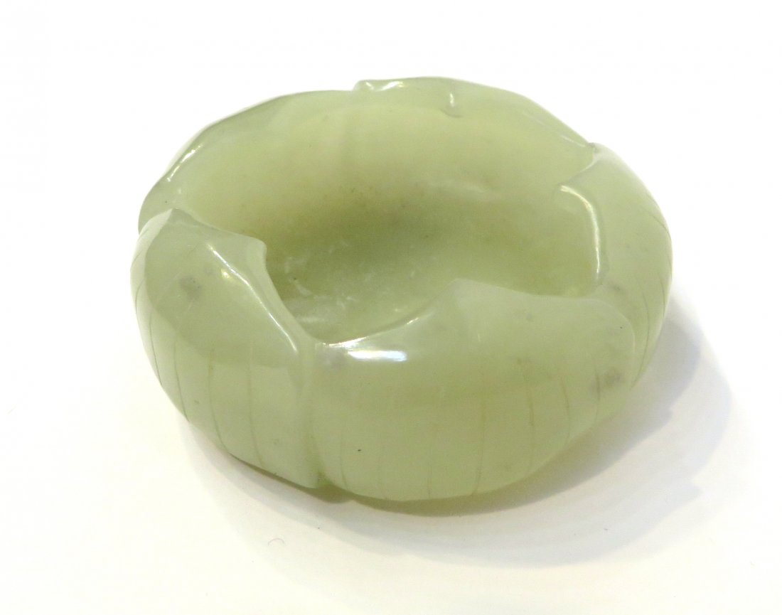 Celadon Jade Brush Washer: 60 grams. 2 1/4" X 5/8" Shipping: We are able to pack and ship this item to an address in the United States for $25.00 via USPS Priority Mail. Tracking information will be sent to your email address. 