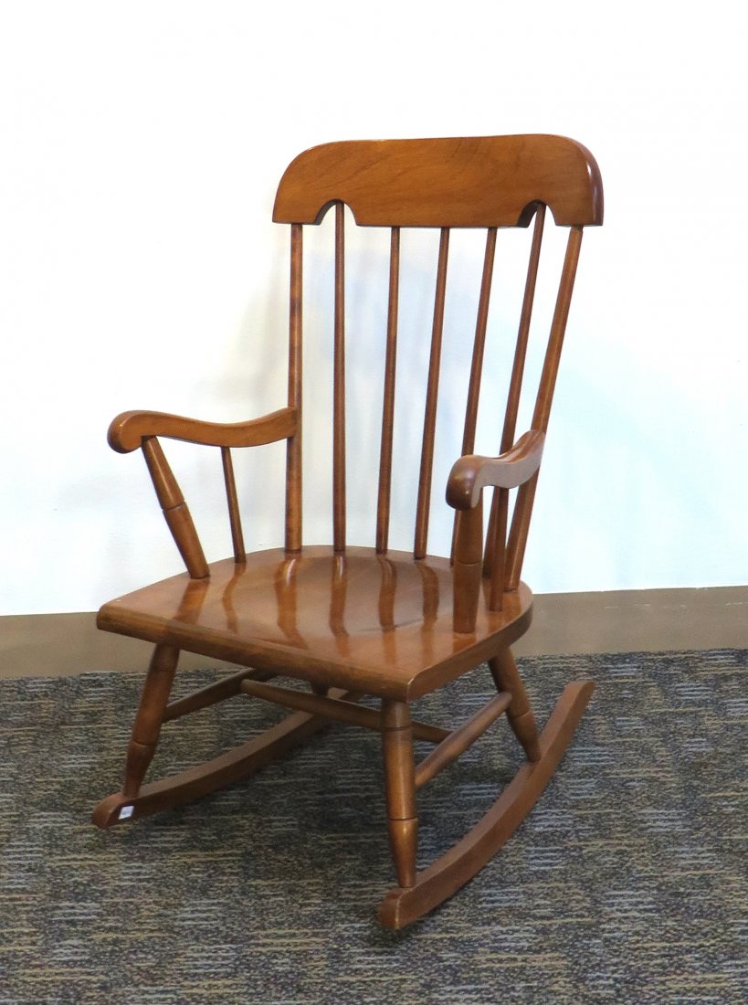 Child's Wooden Rocking Chair: A 28" child's rocking chair. Shipping: We are unable to ship this item. Please contact a third party shipper for a quote. Please be sure and include your shipping address, a description of the lot, in