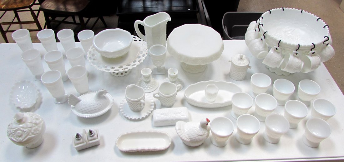 Extensive Milk Glass Set: 57 pieces including 2 cake plates, punch bowl on stand with 12 cups, pair of candlesticks, creamer, sugar bowl, lidded container, 11 short cups, 9 tall cups, small cup, tooth pick holder, two lidded b