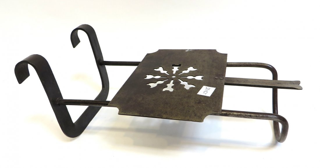 Iron Toasting Device: Wrought iron fireplace "toaster" device. Shipping: We are able to pack and ship this item to an address in the United States for $40.00 via USPS Priority Mail or via FedEx Ground/Home Delivery. Tracki