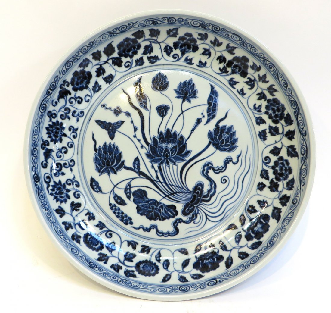 Yongle Porcelain Plate: Blue and White Yongle porcelain plate with a floral design. 13" x 2 1/4" Shipping: We are able to pack and ship this item to an address in the United States for $50.00 via USPS Priority Mail or via Fe