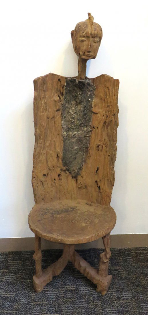 African Throne Chair, Tanzanian, 19th C.: The chair: With extensive termite damage, losses, this carved wood and metal reinforced 48" chair features a carved figurehead surmounting the backrest. Shipping: We are unable to ship this item. Plea