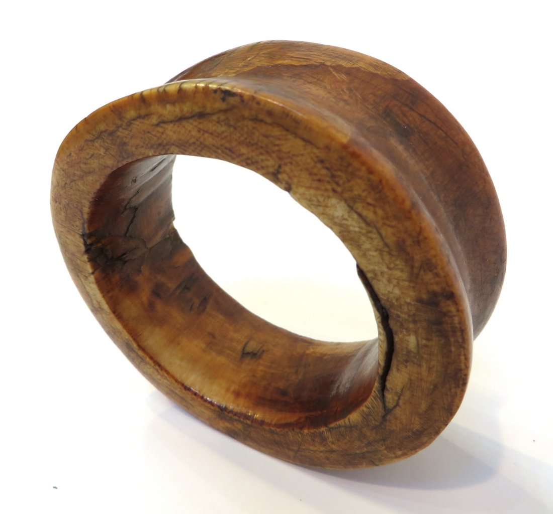 African Ivory Bracelet: Antique ivory bracelet, possibly of Sudanese origins with an outside diameter of 4", Shipping: We are able to pack and ship this item to an address in the United States for $25.00 via USPS Priority Ma