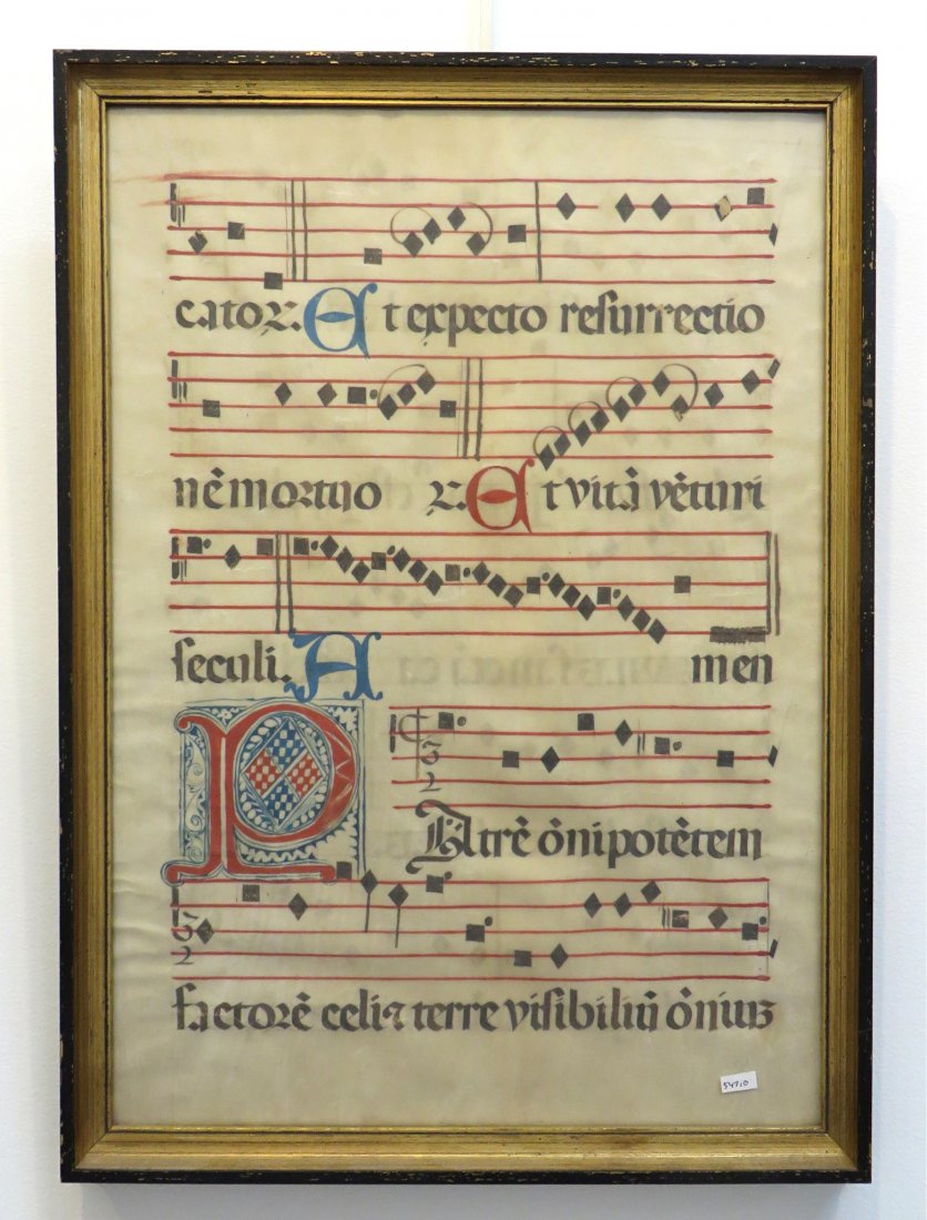 Medieval Music Manuscript Page: Medieval music manuscript page framed, 20 1/4" X 15" Shipping: We are able to pack and ship this item to an address in the United States for $55.00 via USPS Priority Mail or via FedEx Ground/Home Deli