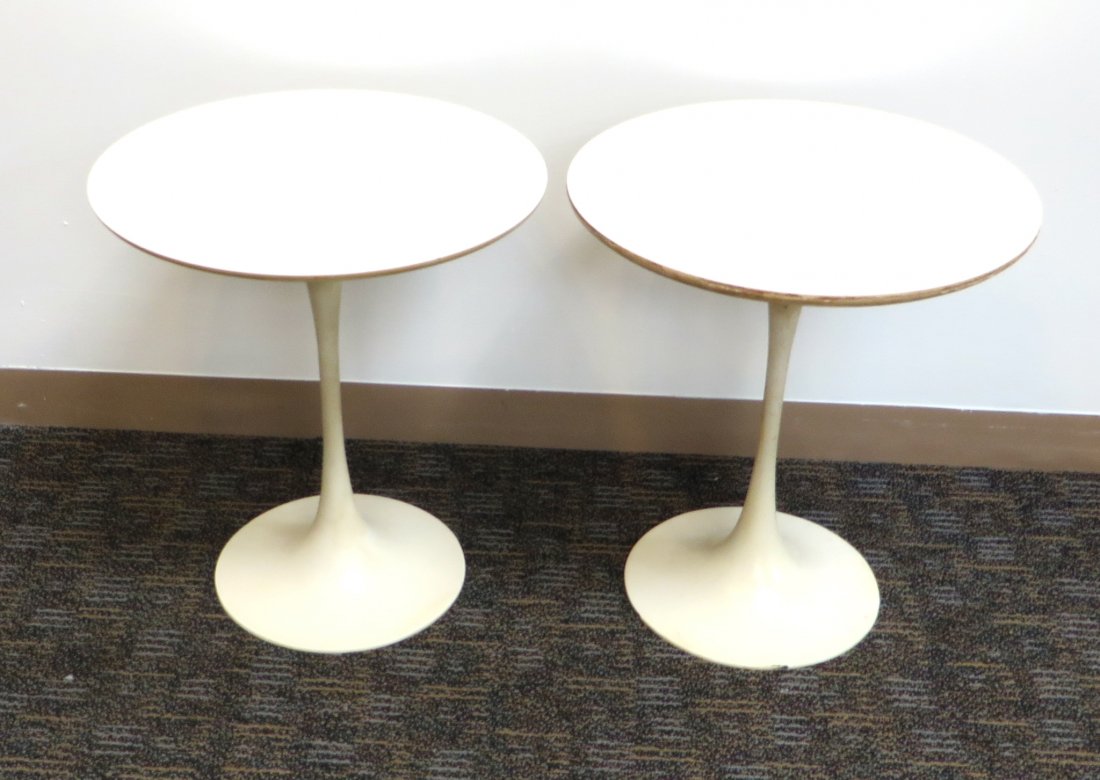 Pair Knoll Saarinen Tulip Tables, unlabeled: A pair of circular top end tables in white by Eero Saarinen, each 17 3/4" across and 20" high. Shipping: We are able to pack and ship this item to an address in the United States for $95.00 via USPS P