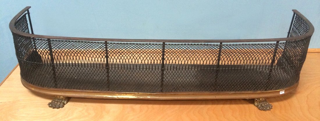 Fireplace Fender: A 42" blackened wire and brass fireplace fender. Shipping: We are unable to ship this item. Please contact a third party shipper for a quote. Please be sure and include your shipping address, a descri