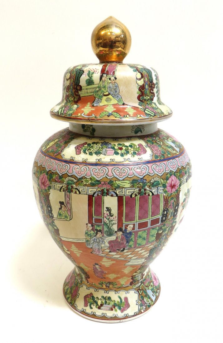 Famille Rose Lidded Jar/Vase: Famille Rose lidded jar/vase with mark on the bottom. 19" tall and approximately 10" wide. Shipping: We are able to pack and ship this item to an address in the United States for $55.00 via USPS Prior