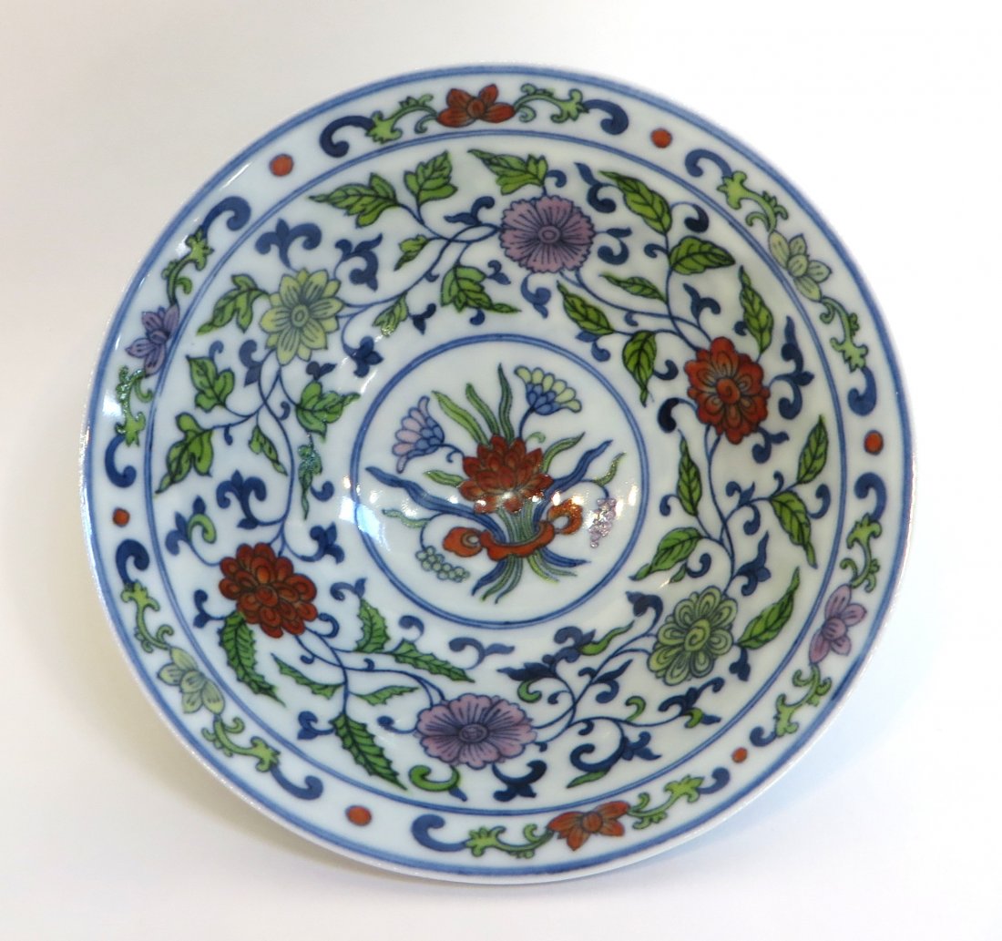 Chinese Ducai Eggshell Porcelain Bowl: Ducai eggshell bowl with flowers and stems. 4 1/2" X 1 3/4" - Marked, small chips Shipping: We are able to pack and ship this item to an address in the United States for $25.00 via USPS Priority Mail.