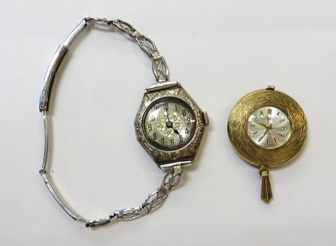 Two Watches: two watches, one with band 2 1/4". Face about1 1/8" Shipping: We are able to pack and ship this item to an address in the United States for $15.00 via USPS Priority Mail. Tracking information will be 
