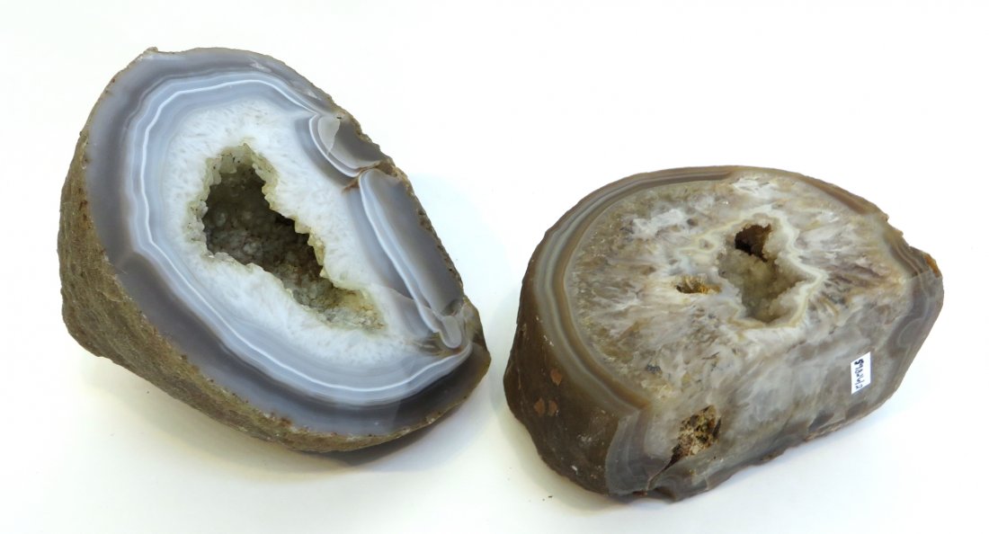 Two Geodes: Smooth rocks. Largest 7" X 5 1/2" X 4" Shipping: We are able to pack and ship this item to an address in the United States for $40.00 via USPS Priority Mail or via FedEx Ground/Home Delivery. Tracking