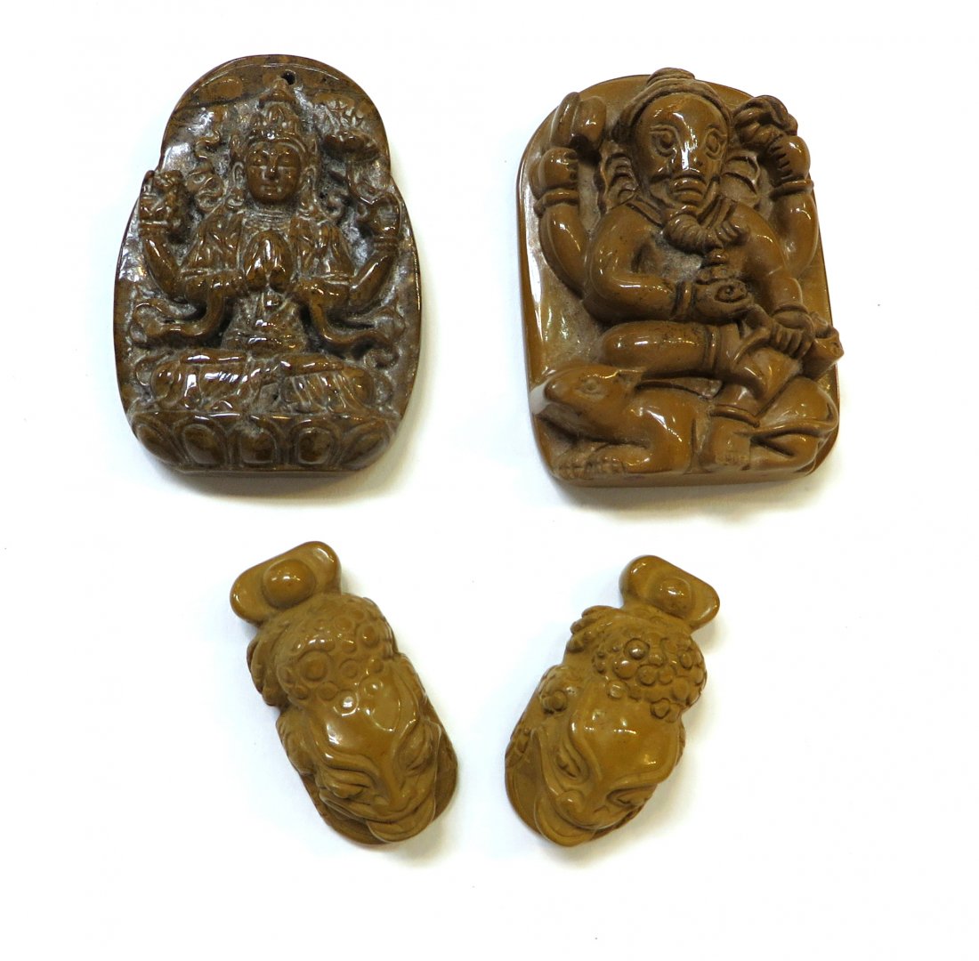 Four Yellow Stone Carvings (1 of 5)