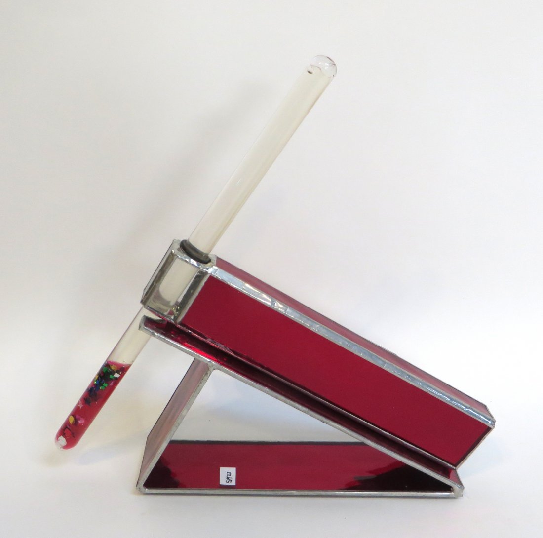 Kaleidoscope With Stand: Kaleidoscope With Stand: Description: Red colored kaleidoscope with handle and stand. Dimensions: Triangular stand is 10" long on one side, 9"