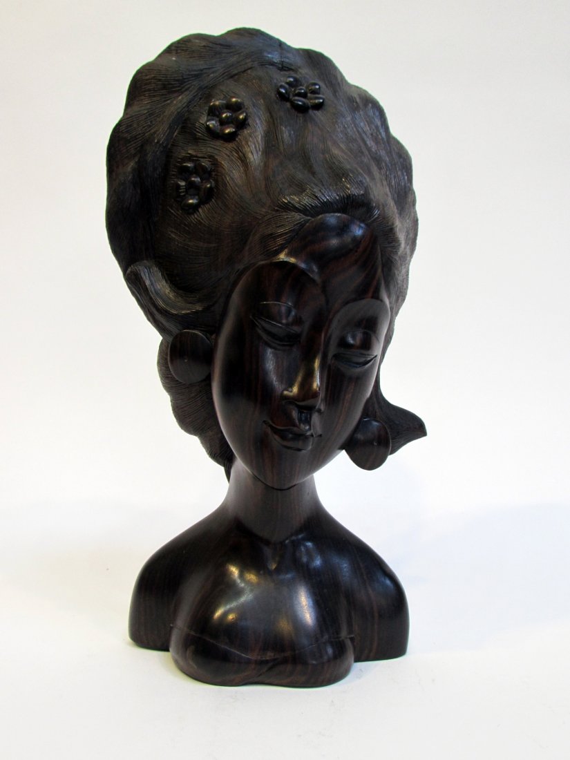 African Carved Ebony Bust Of Woman: African Carved Ebony Bust Of Woman: Description: A carved profile of a young woman. Dimensions: 11 1/2" $80 - $120 Shipping: <