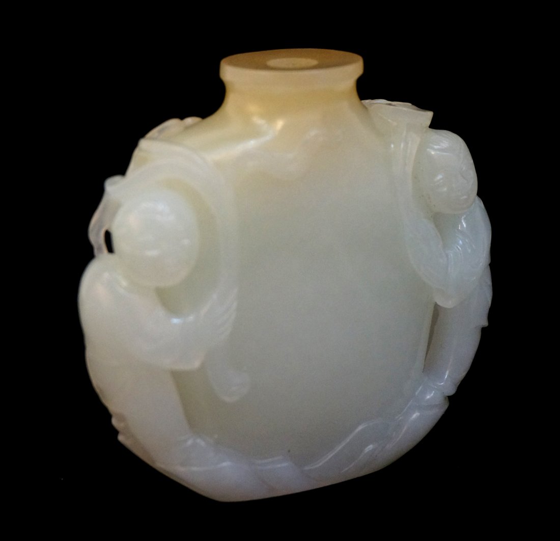 White Jade Snuff Bottle: White Jade Snuff Bottle: White jade snuff bottle with children handles carved on each side. 53 mm $800 - $1200 Shipping: We are abl
