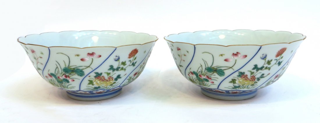 Pair Of Daoguang Bowls: Pair Of Daoguang Bowls: Two bowls with scalloped edges which have alternating seasonal flower scenes above a patterned, footed base. In famille rose and Dao Guang mark on the bottom.