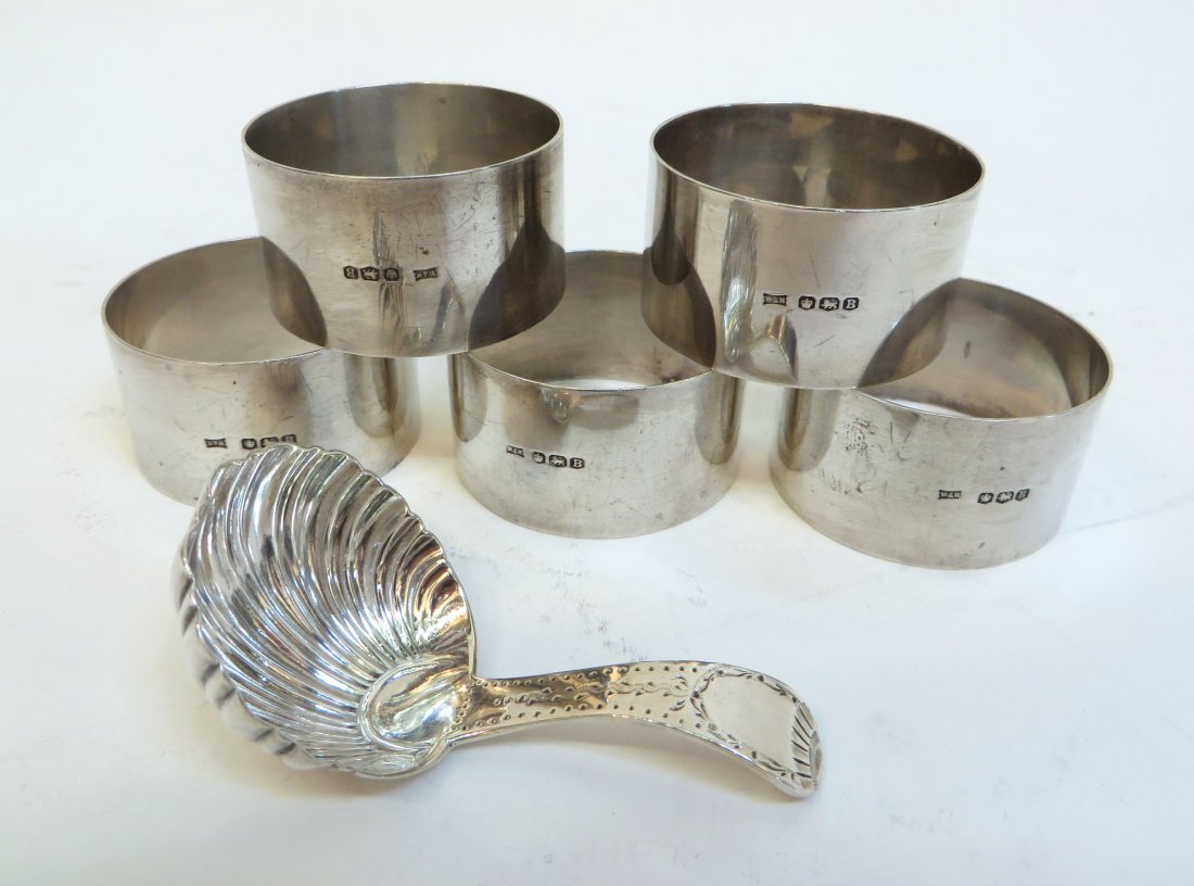 Six Pieces Of Sterling Silver: Six Pieces Of Sterling Silver: Five napkin rings and one small ladle. All hallmarked. Napkin rings marked W & H. 138 grams Napkin rings 1 3/4", ladle 2 3/4"