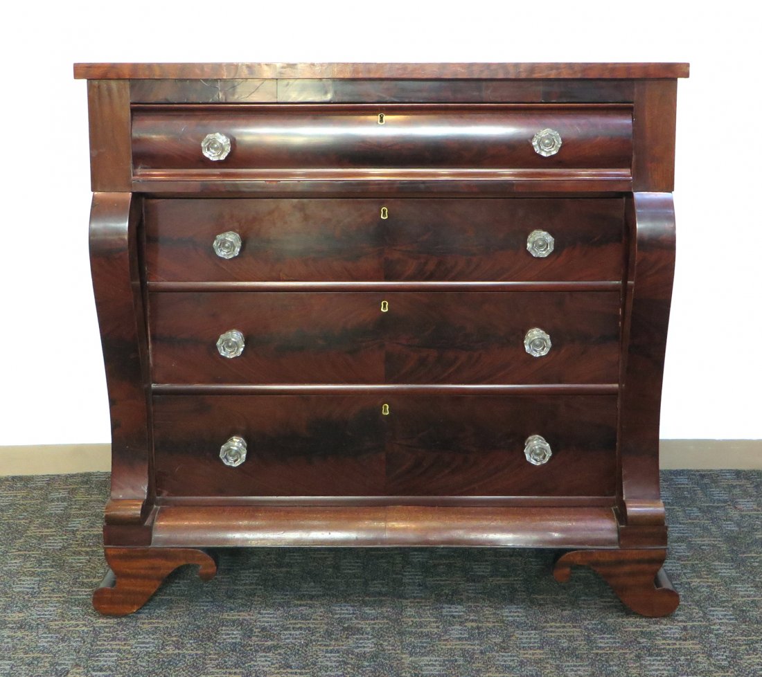 James Chalfont 19th Century Empire Chest: James Chalfont 19th Century Empire Chest: Book match mahogany venire empire chest with crystal pulls and brass escutcheon plates. One long top drawer and three drawers underneath in dovetail. The top