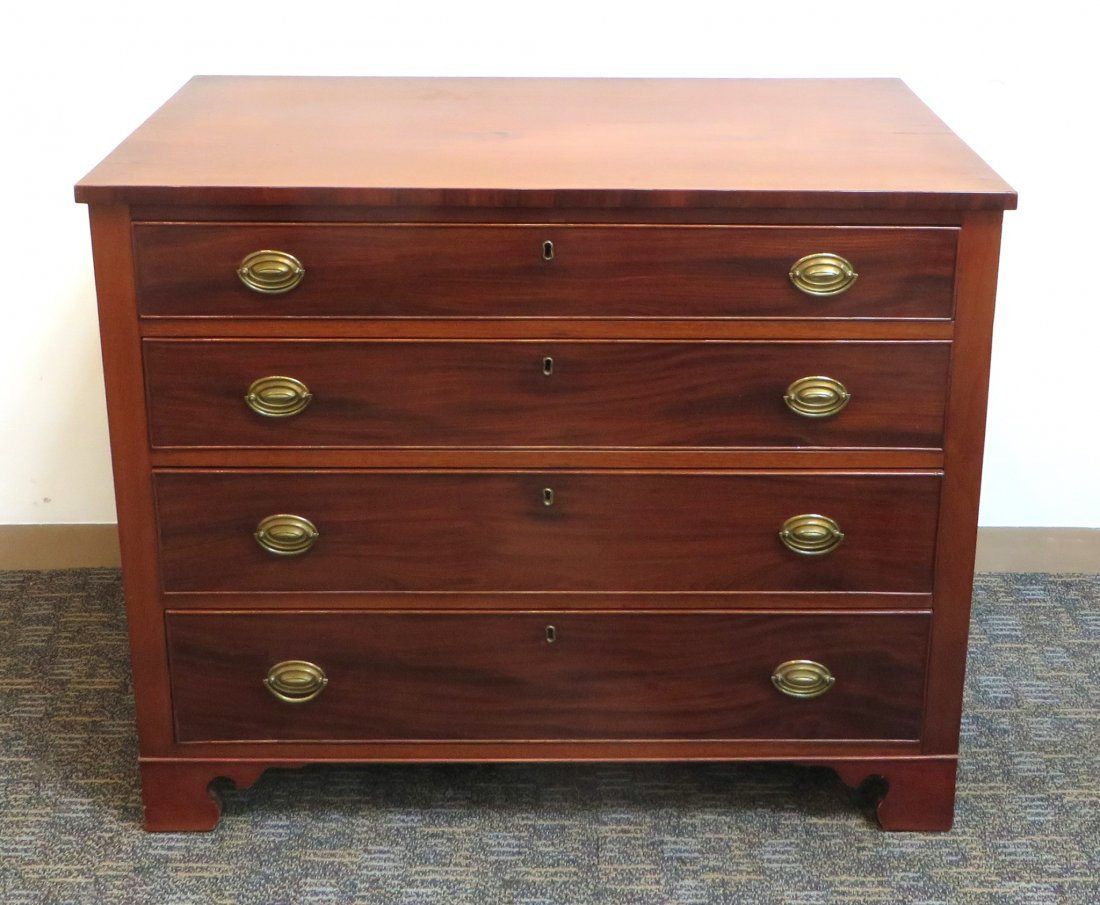 Hepplewhite Chest Of Drawers: Hepplewhite Chest Of Drawers: Four drawers of graduating sizes with pulls and escutcheon plates made of brass. Drawers are beaded and dovetailed. Constructed of mahogany. 19th century