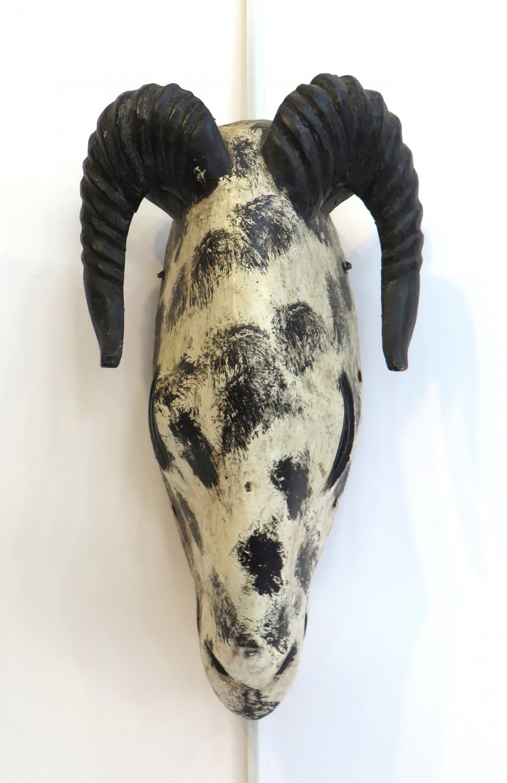 African "Antelope" Mask: African "Antelope" Mask: Painted in black and white, and carved in great detail. 12" X 7" $200 - $400 Shipping: