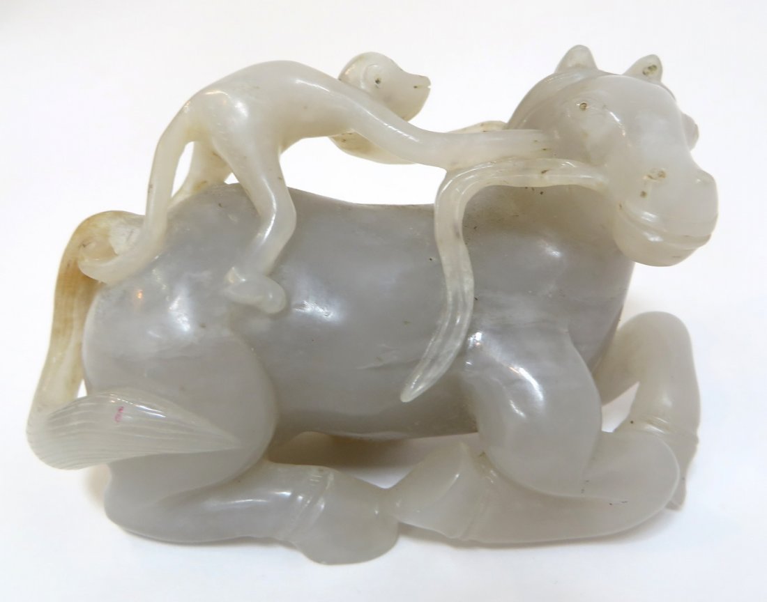 White Jade Carving: White Jade Carving: With a Monkey Riding a Horse R 3 3/4 x 2" $800 - $1200 Shipping: We are able to pack and ship this item to