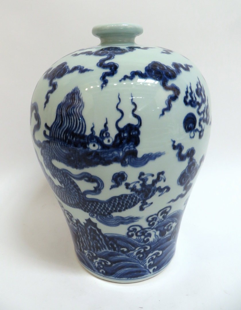 Blue & White Dragon Meiping: Blue & White Dragon Meiping: A blue and white vase decorated with a five clawed dragon among flaming pearls and over waves. 12 1/2" X 9" $100 - $12