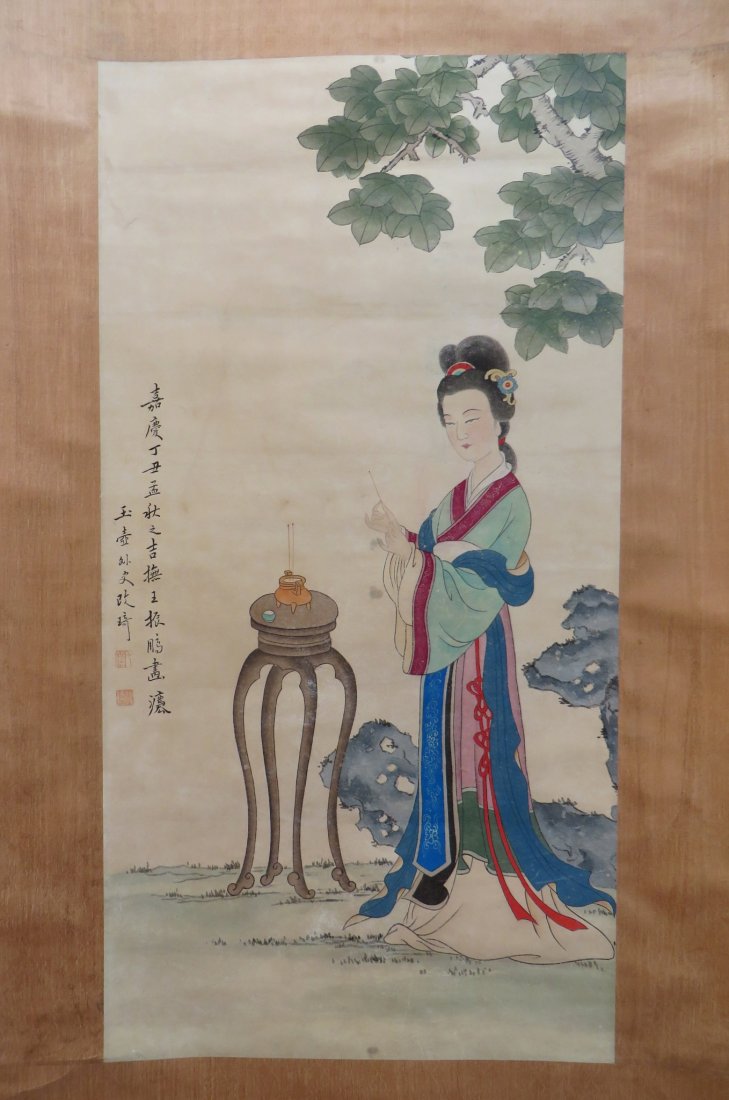 Beautiful Woman Chinese Watercolor Scroll: Beautiful Woman Chinese Watercolor Scroll: Chinese watercolor painting with a woman lighting incense in a garden. Features calligraphy and red artist seals along the front left.
