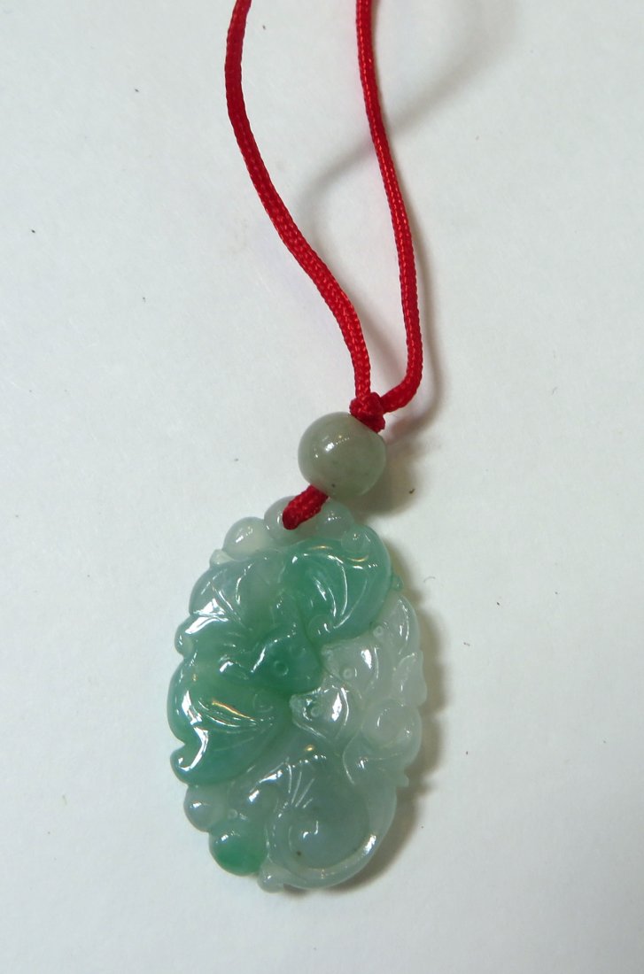 Jadeite Pendant: Jadeite Pendant: A jadeite pendant of a bat. 1" $20 - $30 Shipping: We are able to pack and ship this item to an address in th