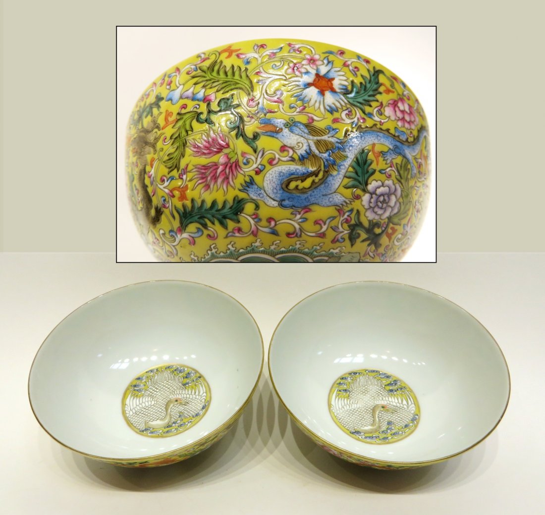 PAIR OF QIAN LONG FAMILLE JAUNE DRAGON BOWLS: Pair Of Qian Long Famille Jaune Dragon Bowls : Having simply deep bowl, rounded cavetto to flat opening, upon narrow concave footed base. The exterior wealthy decorated with famille rose hand paintin