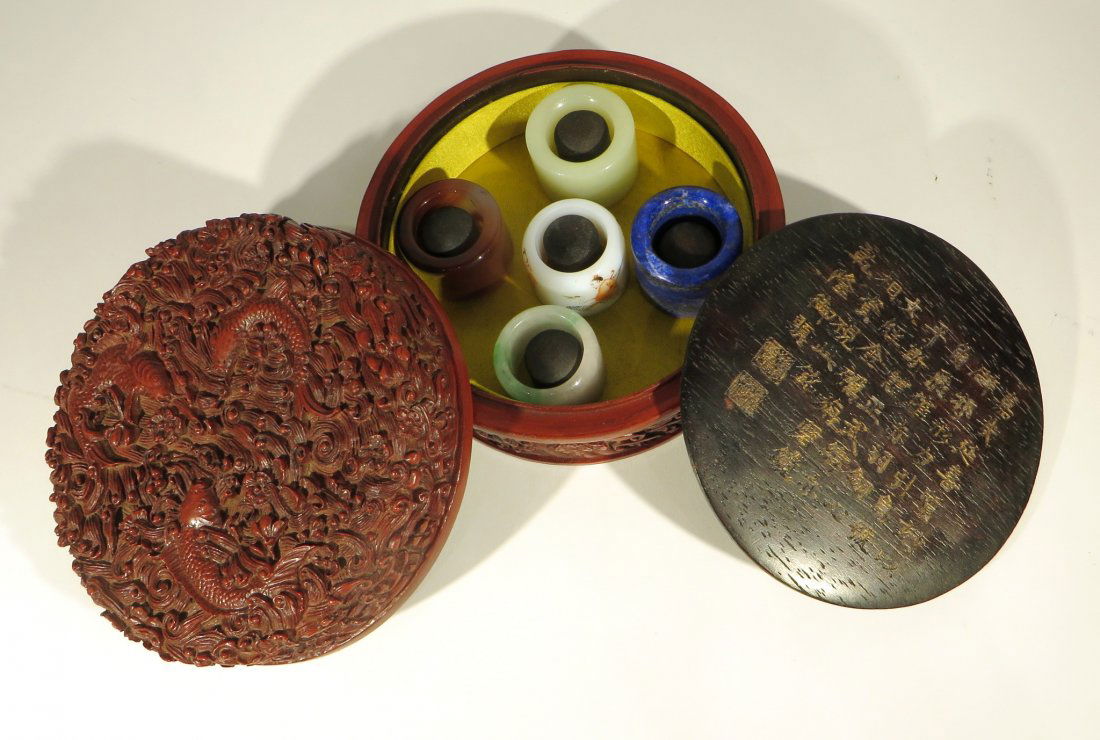 CHINESE SET OF ARCHER'S RINGS IN CINNABAR BOX (1 of 10)