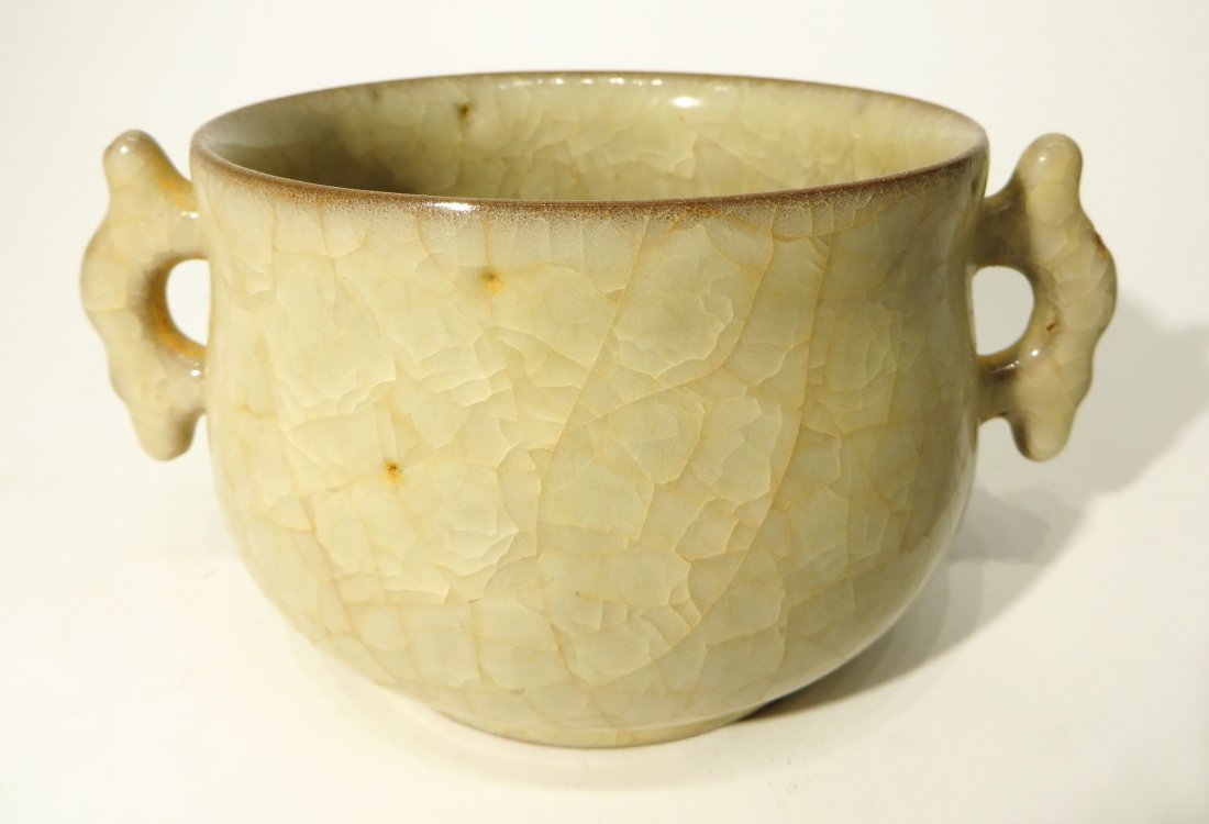 CHINESE ANTIQUE CHINESE CENSER: Chinese Antique Chinese Censer: The compressed globular body raised on concave footed ring gently tapered to waisted short neck leading to slightly flared and wide opened rim, two curved horn shaped