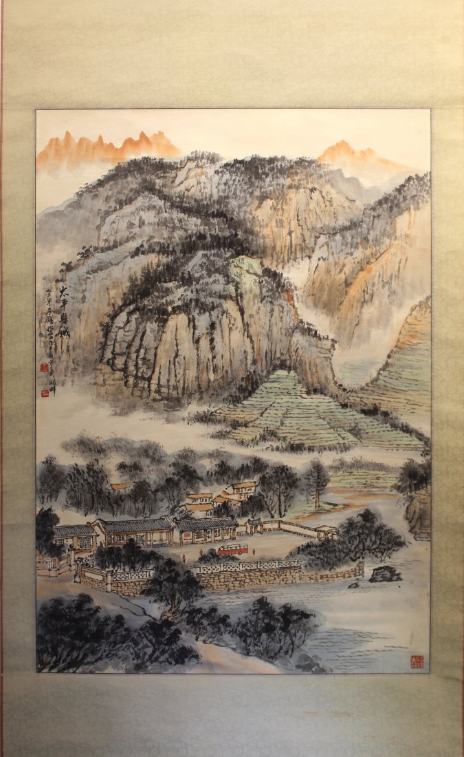 MOUNTAIN & VILLAGE SCENE SIGNED QIAN SONGNIAN: Mountain & Village Scene Signed Qian Songnian: The upper half of this painting shows rugged dark mountains tinged with orange and the mountains most distant are orange peaks. A bustling village i