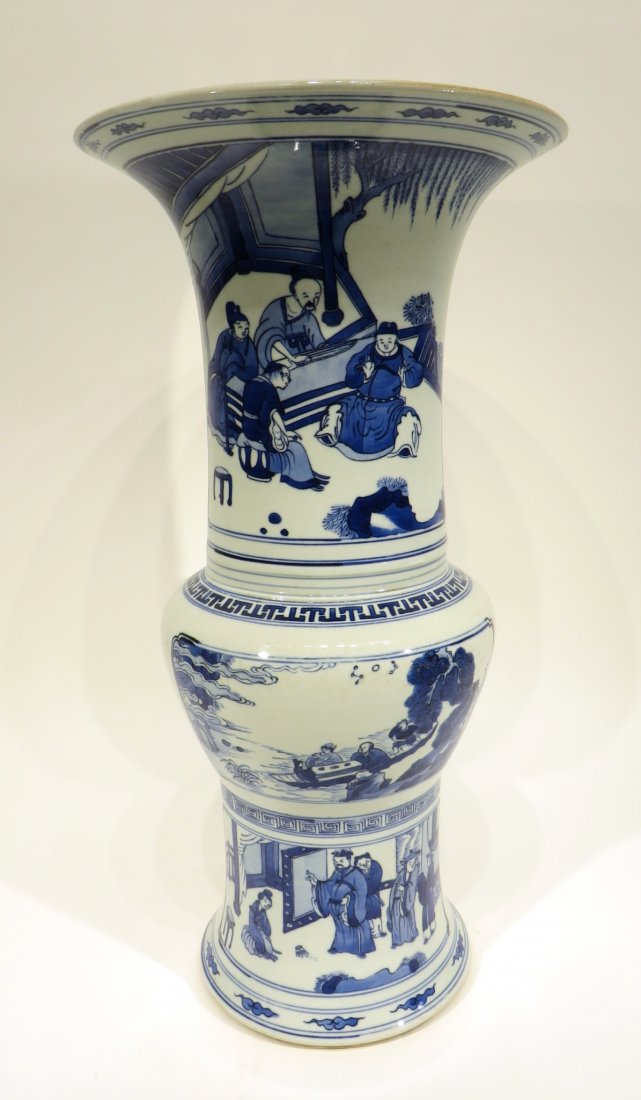 CHINESE KANG XI MARKED BLUE AND WHITE VASE: Chinese Kang Xi Marked Blue And White Vase: The vase potted in shape of a phoenix tail, Chinese porcelain traditional yen yen shape. The beaker having baluster shaped body, with bulging belly, trumpe