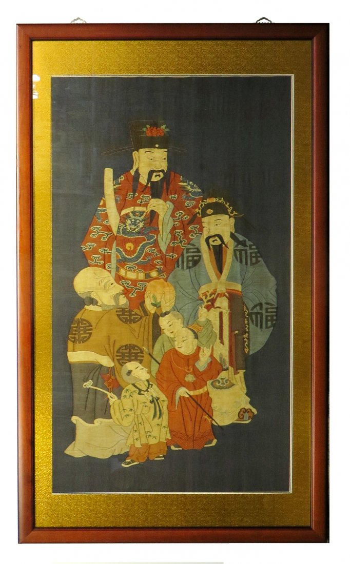 CHINESE KESI IN FRAME: Chinese Kesi In Frame: An emperor wearing dragon and flaming pearl embroidered robes is surrounded by a lohan offering a peach, an advisor, and three children. One of the children is holding a ruyi.