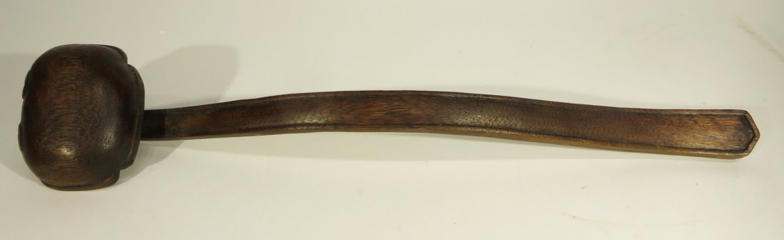 CHINESE CHEN XIANG WOOD RUYI: Chinese Chen Xiang Wood Ruyi: Carved Zitan wood grant wishing wand or ruyi with a subtle grain. Pillow topped head carved with facing spirals. Incised lines border all edges.