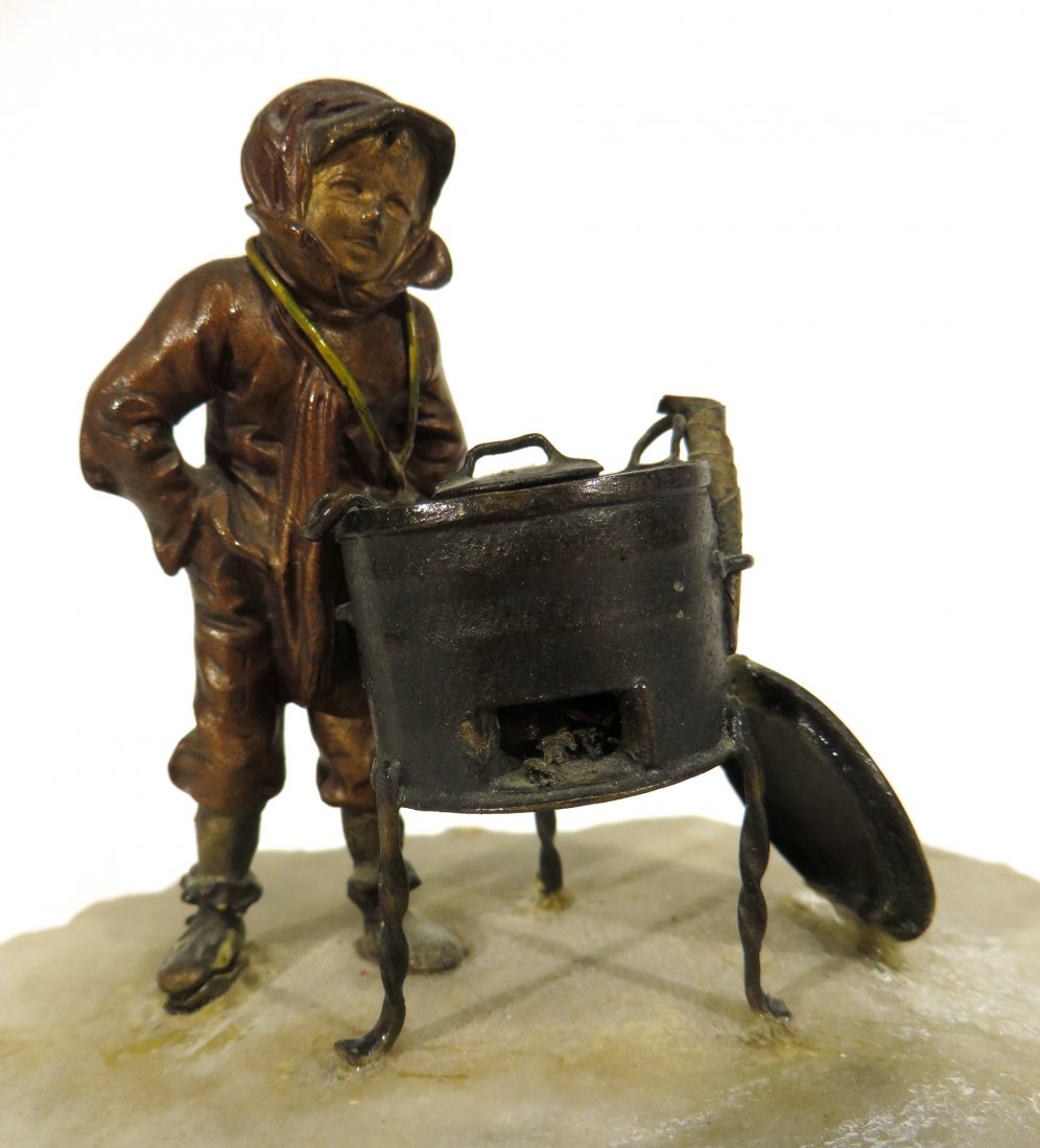 COLD PAINTED BRONZE CASTING: Cold Painted Bronze Casting : Mounted onto white marble. A youngster out in the cold snow, in front of a stove. 4" $100 - $200 Shipping: