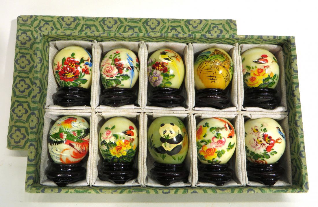 TWELVE STONE 'EGGS' ON STANDS (1 of 2)