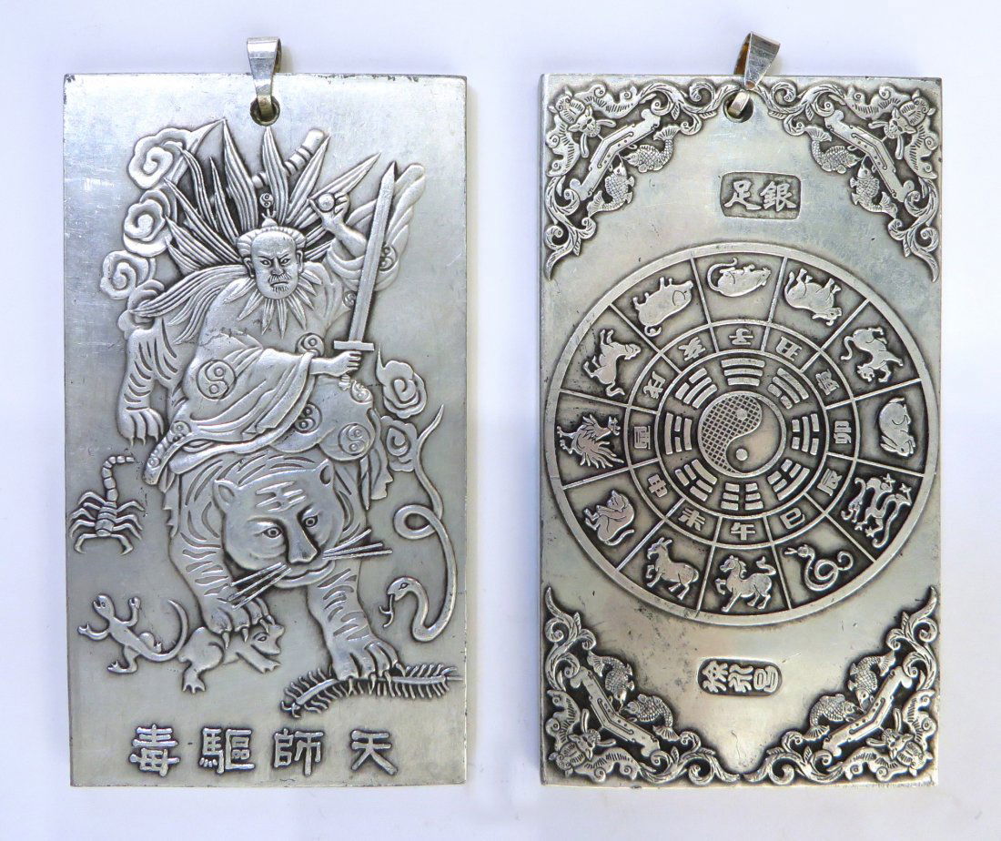 TWO SILVER PENDANTS (1 of 4)