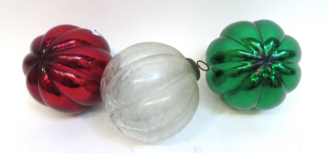 SET OF THREE KUGEL BALLS: Set Of Three Kugel Balls: Three gourd shaped Kugel balls in red, green, and clear. Each have a hook for hanging. 6" $100 - $200 Shipping: