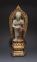 CHINESE JADE BUDDHA WITH A GILT BRONZE SHRINE