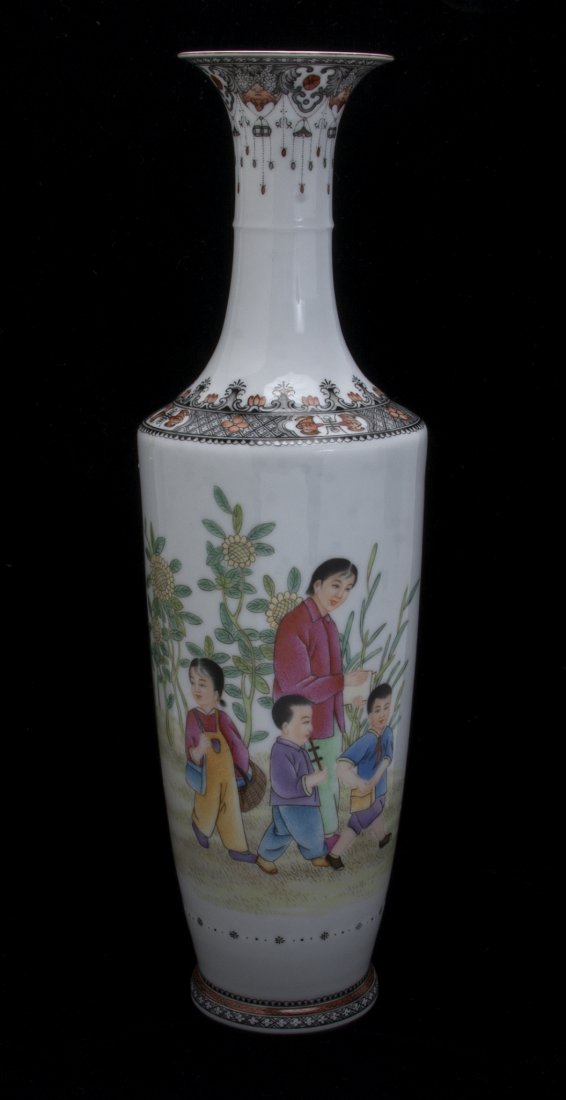 20TH C. FAMILLE ROSE VASE: 20th C. Famille Rose Vase: A vase made of thin white porcelain in a slender shape with a trumpet top. A woman and children walk among sunflowers. Calligraphy is on the reverse. Detailed border at th