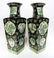PAIR OF FAMILLE NOIR KANG XI WU CAI VASES