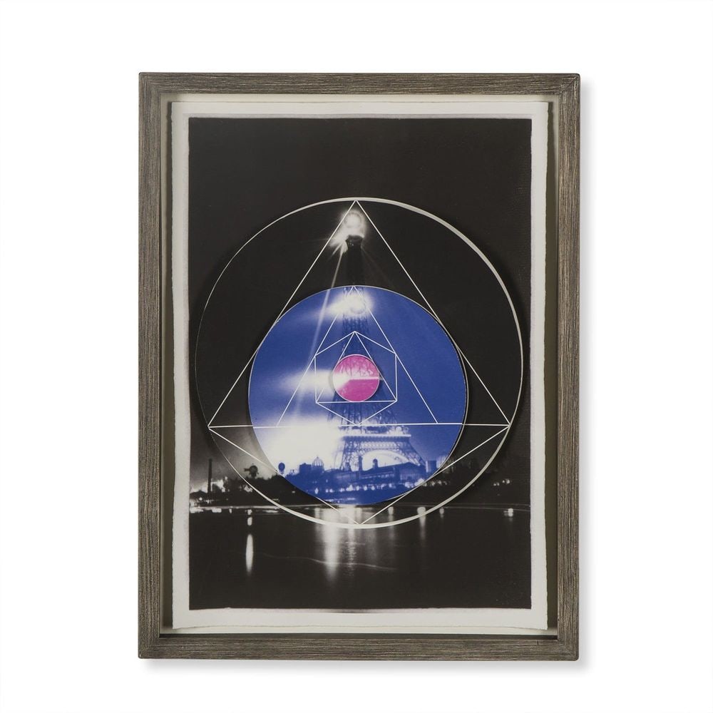 Eiffel Tower: Dimensions: 1.5 D x 22.5 H x 17 L Hand Cut Paper, Cotton Flannel, Clear Glass, Profile Moulding Wood, Wood backing Moisture Resistant This artistic interpretation of the