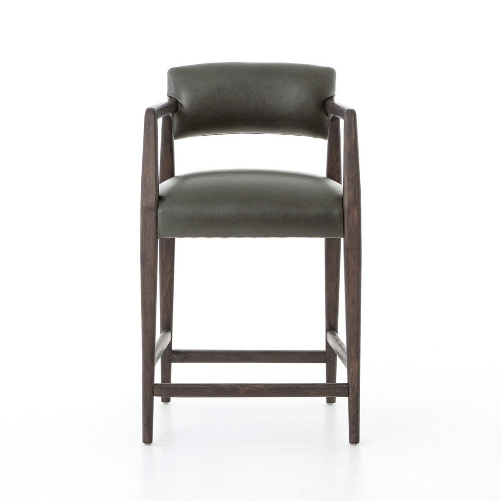 Ivy Counter Stool - Chaps Ebony: Seat Height: 26.38 Description: Counter seating is styled with an angular, dark and smoky birch frame, a deep seat, and a striking, low-slung back. Covered in black, top-grain leather.