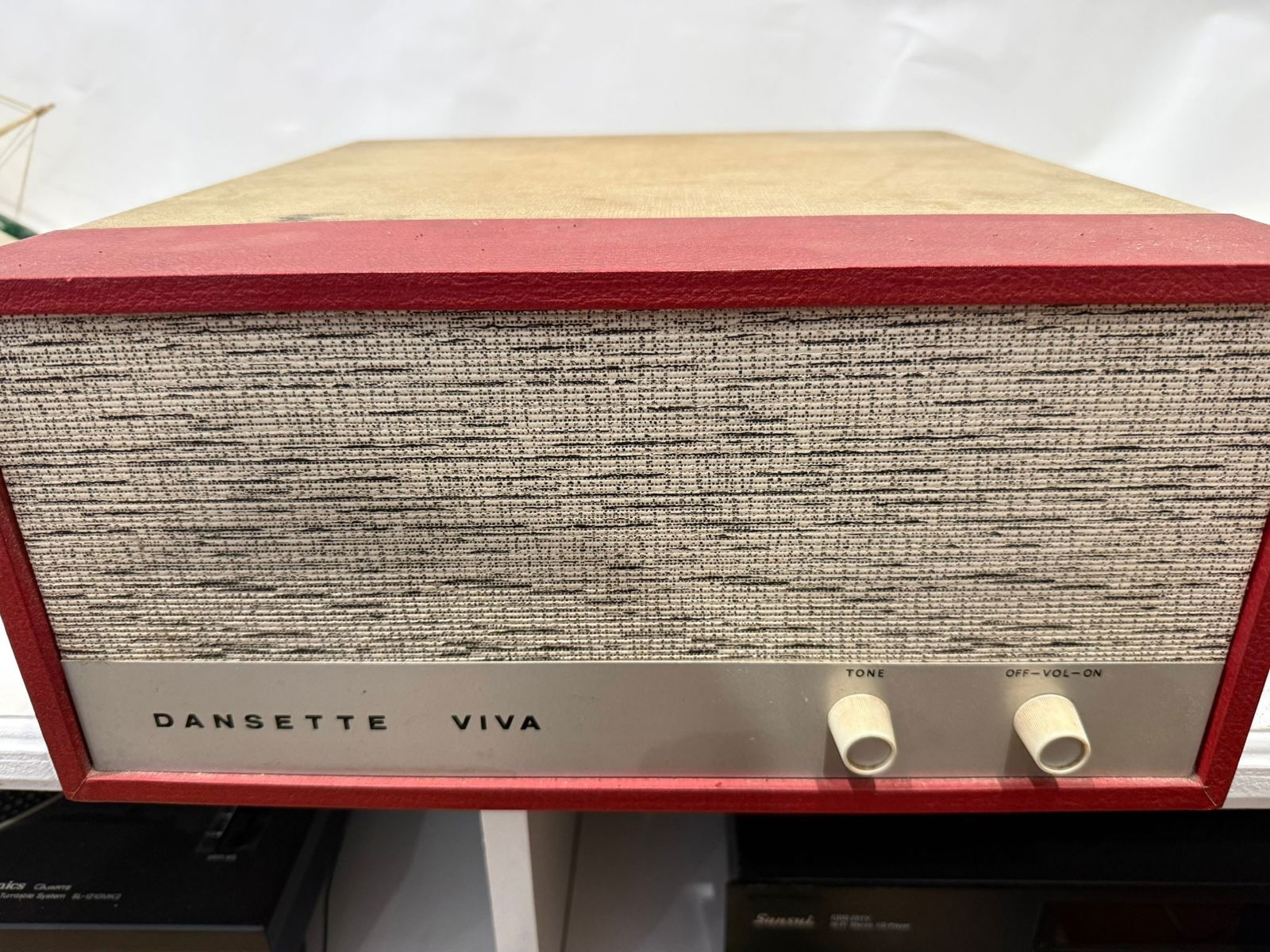 DANSETTE VIVA record player: The Dansette Viva is a vintage British portable record player from the late 1950s to early 1960s, made during the height of the UK rock-and-roll and pop era. Dansette players are highly collectible,