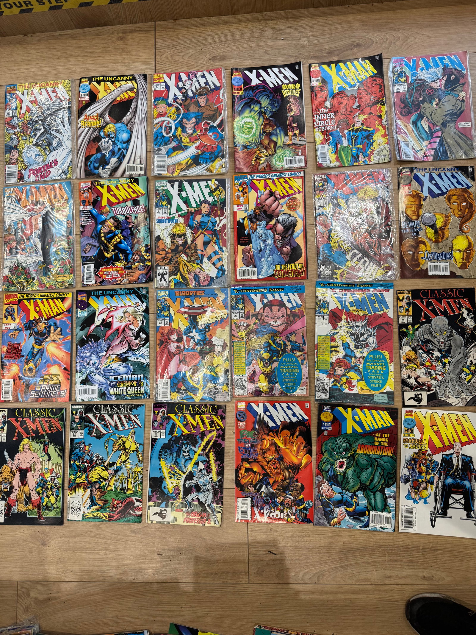 24 X-Men Comic Book Lot: A collection of Marvel X-Men comic book issues, mainly from the late 1980s 1990s, featuring classic storylines, popular characters, and iconic artwork