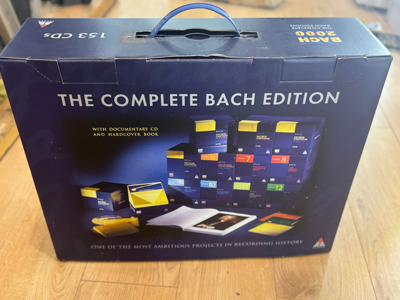 Bach 2000 complete edition, a 153-CD box set of Johann Sebastian Bach's works.: The set was released by the Teldec record label. box opened cd.s ore new It contains 12 volumes of Bach's music, including sacred and secular cantatas, organ works, keyboard works, and