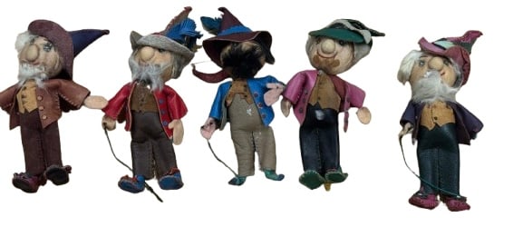 Vintage Handcrafted Cloth Dolls – Set of Five: A charming set of five vintage handmade cloth dolls, each with a whimsical, storybook character appearance. The figures feature expressive stitched faces, oversized noses, and individually styled