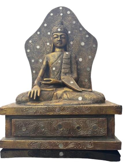 Carved Wooden Buddha Statue on Plinth: A finely carved wooden Buddha statue seated in a meditative pose, mounted on an integral tiered rectangular plinth. The figure is backed by a decorative aureole panel, richly detailed with carved