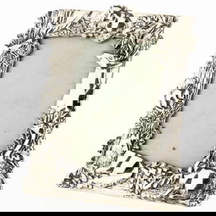 Silver Plated Animals Photograph Frame: Height: 15.0 cm, Width: 13.5 cm. It is the responsibility of the Buyer to carefully examine each lot and form their own judgment regarding its condition, description, provenance, and authenticity
